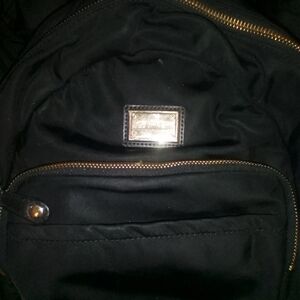 Calvin Klein Collection Black Backpack with Gold Accents